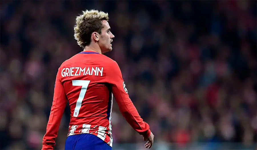 Antoine Griezmann wearing trendy blonde hairstyle