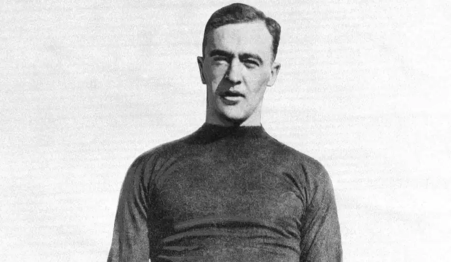 George Gipp running with the football in his Notre Dame uniform