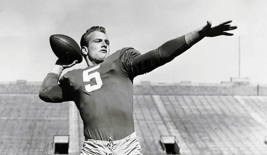 Paul Hornung playing for Notre Dame in the 1950s, showcasing his athletic brilliance