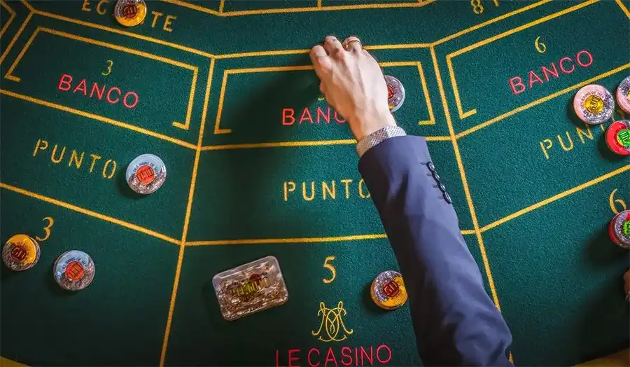 Punto Banco table with dealer handling automatic card draws