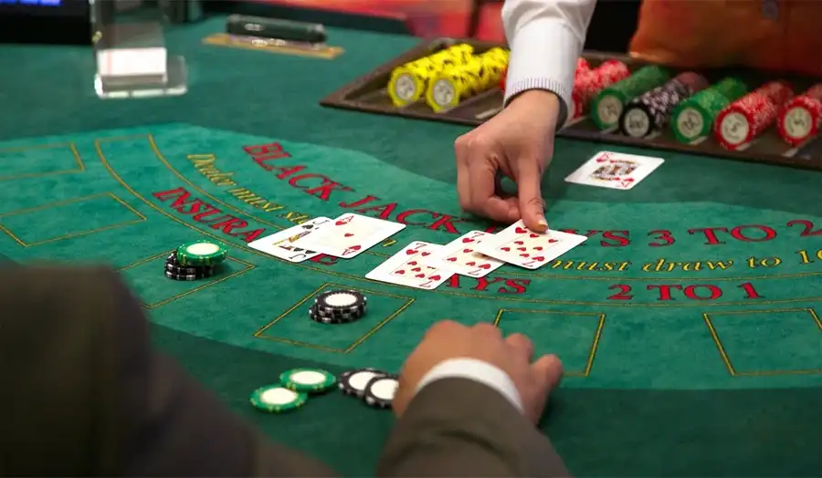 Casino blackjack table with cards and chips