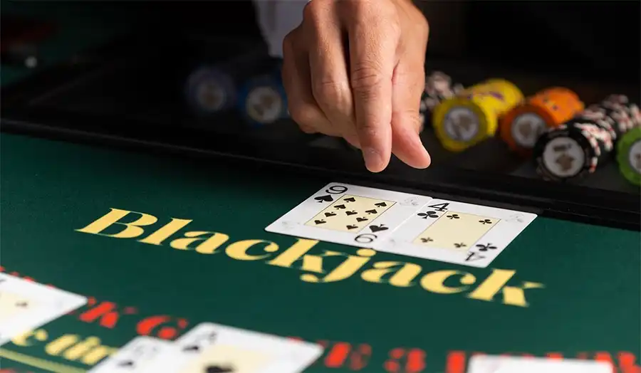 Visual concept of probability in Blackjack with cards and math symbols