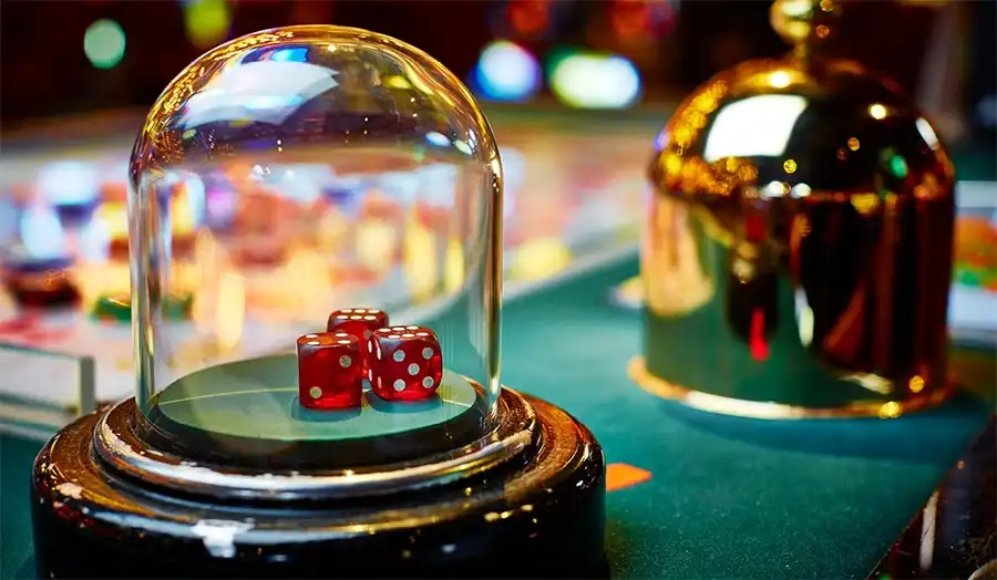 Sic bo dice inside a shaking container