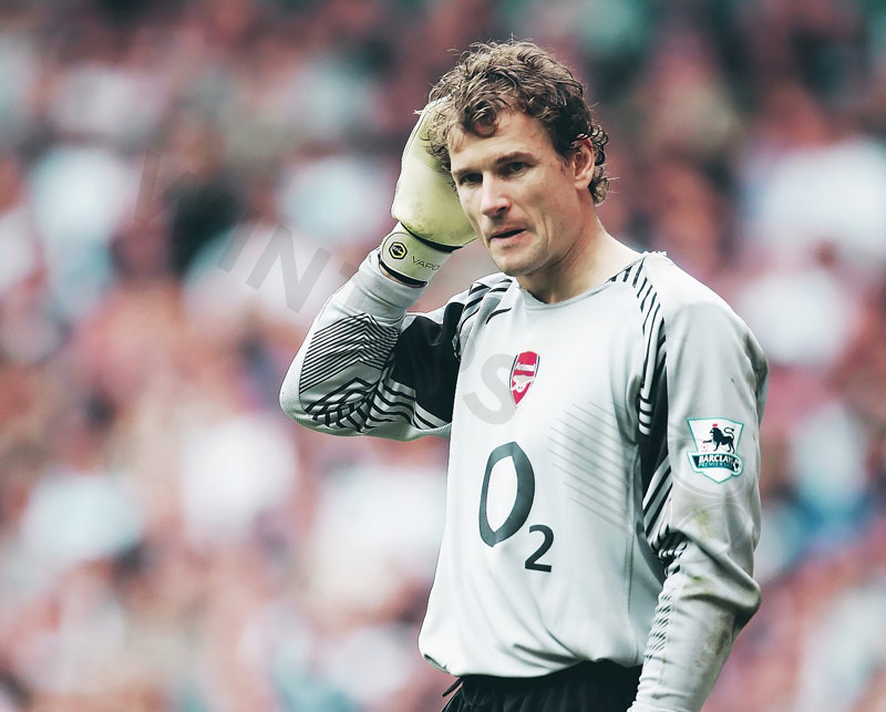 The last name is Arsenal goalkeeper Jens Lehmann