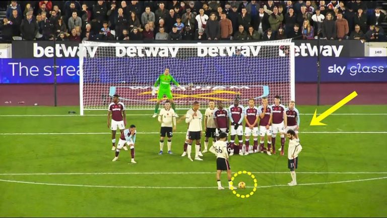 Before taking a free kick, the referee must adjust the fence